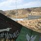Partial view of the US-Mexico border wall painted by members of the Brotherhood Mural organization in Tijuana, Mexico