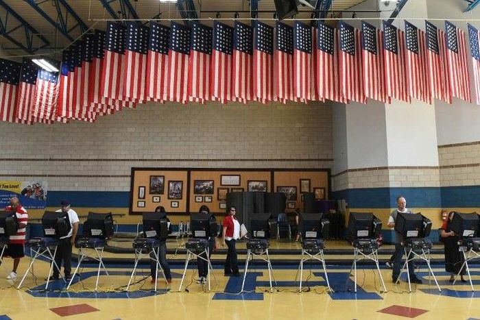 Voters cast their ballots on machines at Cheyenne High School on Election Day on November 8, 2016 in Las Vegas, Nevada