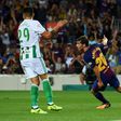 Barcelona's midfielder Sergi Roberto (R) celebrates after scoring against Real Betis at the Camp Nou stadium in Barcelona on August 20, 2017