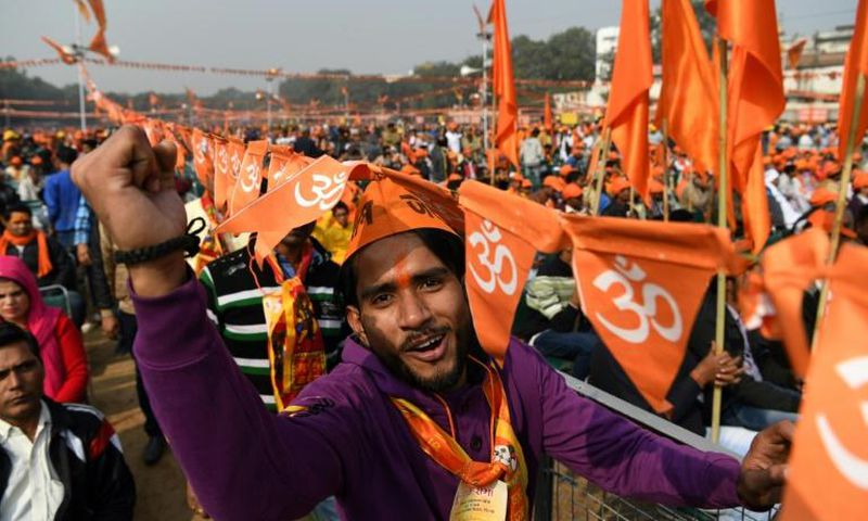 Devotees clad in saffron filled a huge parade ground in the Indian capital under tight security