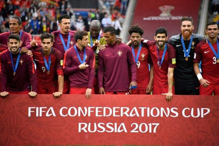 Portugal's players pose with their bronze medals after beating Mexico during a third-place play-off at the Confederations Cup in Moscow, on July 2, 2017