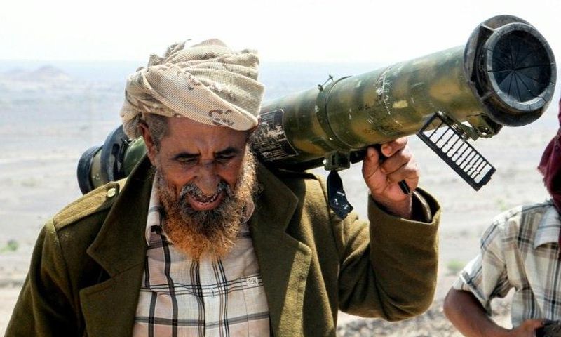A fighter loyal to Yemen's Saudi-backed president, in the mountains outside the central city of Taez