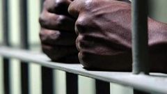 man behind bars