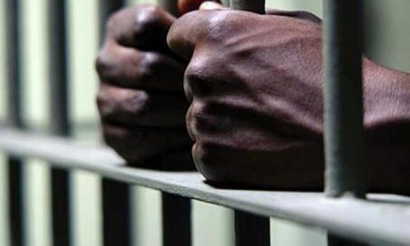 man behind bars