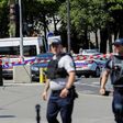 Police seal off an area of the Champs-Elysees in Paris on June 19, 2017