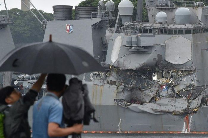 Water gushed into the destroyer after the accident left a large tear in its side