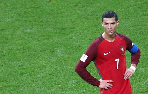 Portugal's forward Cristiano Ronaldo reacts during the 2017 Confederations Cup semi-final football match against Chile at the Kazan Arena June 28, 2017