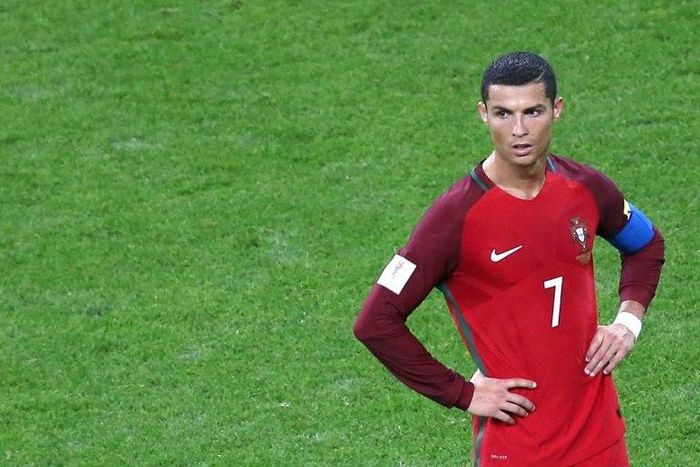 Portugal's forward Cristiano Ronaldo reacts during the 2017 Confederations Cup semi-final football match against Chile at the Kazan Arena June 28, 2017