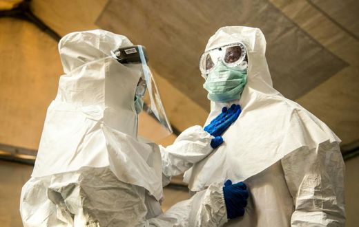 Uganda announced a plan last month to roll out ebola vaccinations for frontline health workers, like these pictured in western Uganda in August