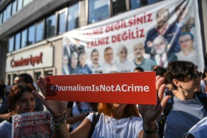 Seventeen directors and journalists from Cumhuriyet, one of Turkey's most respected opposition newspapers, deny charges of supporting "terrorist" organisations