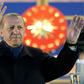 Turkey's President Recep Tayyip Erdogan acknowledges supporters in Ankara in April 2017