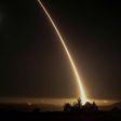 A streak of light trails into the night sky as the US military test fires an unarmed intercontinental ballistic missile (ICBM) at Vandenberg Air Force Base, California on May 3, 2017