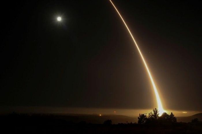 A streak of light trails into the night sky as the US military test fires an unarmed intercontinental ballistic missile (ICBM) at Vandenberg Air Force Base, California on May 3, 2017