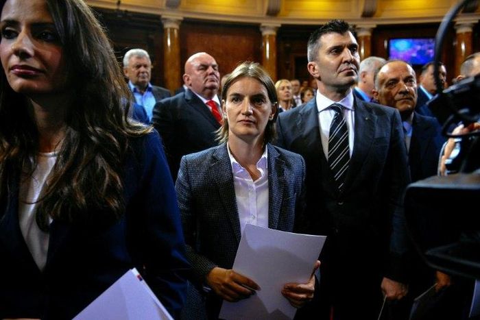 Ana Brnabic (C), pictured attended a swearing-in ceremony at the Serbian Parliament on August 11, 2016, becomes the first gay premier in the Balkans