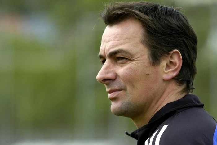 This photo taken on April 28, 2004 shows French soccer trainer Stephane Paille watching during a training session at the Malcombe stadium in Besancon