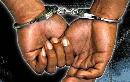 A criminal in handcuffs