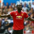 Manchester United's striker Romelu Lukaku celebrates scoring the team's second goal during the English Premier League football match against Swansea City August 19, 2017