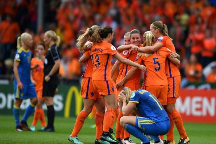 Dutch players celebrate after winning the UEFA Women's Euro 2017 match against Sweden at the De Vijverbeg stadium in Doetinchem on July 29, 2017