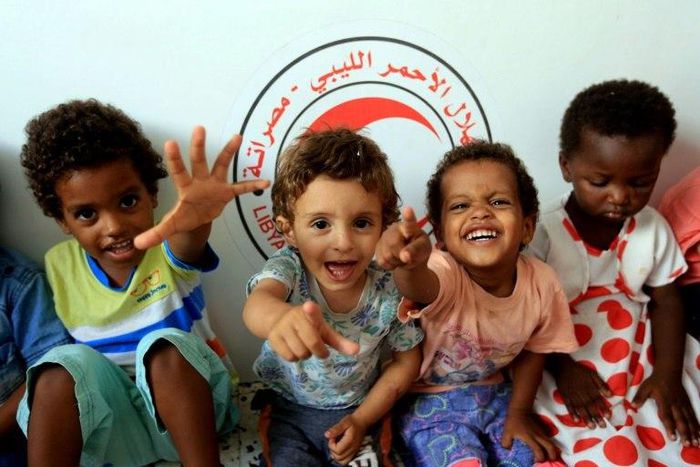 A picture taken on August 2, 2017 shows children of Islamic State group fighters now living in the Libyan Red Crescent headquarters in Misrata, a town half-way between Sirte and Tripoli