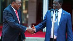Uhuru Kenyatta with Raila Odinga during the 09 March handshake