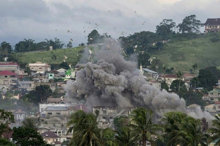 A bomb explodes after being dropped on an Islamist militants' hideout in Marawi, on the southern Philippine island of Mindanao