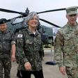 South Korea's Foreign Minister Kang Kyung-Wha (centre) says she is open to talks with her North Korean counterpart