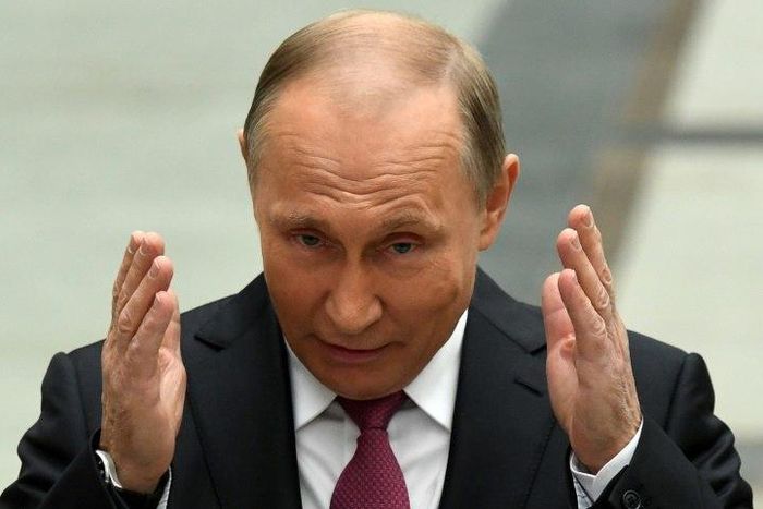 Russian President Vladimir Putin speaks with journalists after his annual phone-in show in Moscow, on June 15, 2017