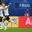 Germany's midfielder Lars Stindl (L) and defender Joshua Kimmich celebrate winning the Confederations Cup final on July 2, 2017