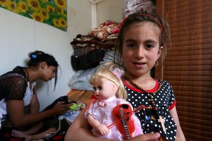 Christina, 6, is reunited with her family three years after her abduction by jihadists in Iraq