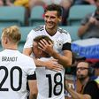 Germany's midfielder Leon Goretzka is congratulated by Germany's defender Joshua Kimmich after he scored a goal on June 19, 2017