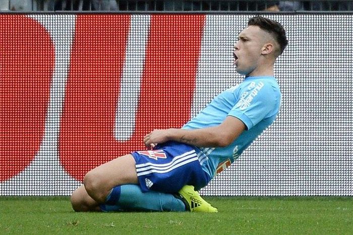 Marseille's forward Lucas Ocampos celebrates after scoring a goal during the French L1 football match between Nantes and Olympique de Marseille on August 12, 2017 at the Beaujoire stadium of Nantes, western France