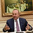 Turkish Foreign Minister Mevlut Cavusoglu, pictured in June 2014, intervened on behalf of the two reporters detained in Mecca