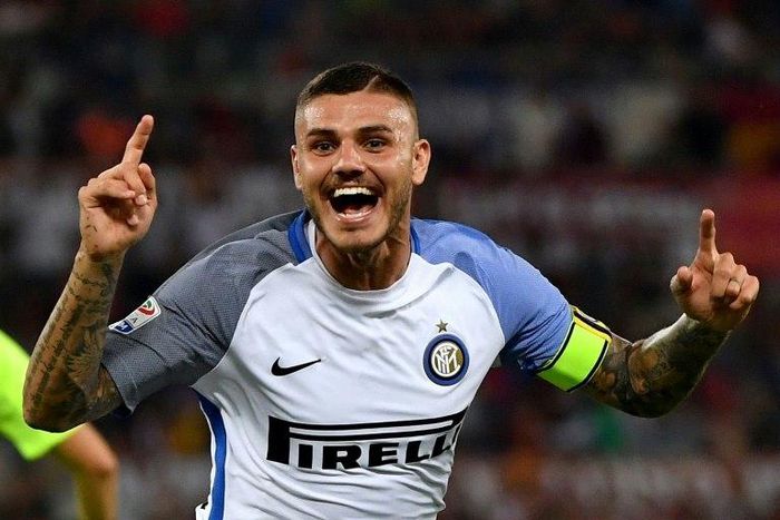 Inter Milan's forward Mauro Icardi celebrates after scoring his 2nd goal during the Italian Serie A football match against Roma August 26 , 2017