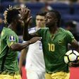 Darren Mattocks (R) of Jamaica celebrates with teammate Owayne Gordon after scoring a goal against El Salvador during their CONCACAF Gold Cup Group C match, at the Alamodome in San Antonio, Texas, on July 16, 2017