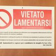 A sign on the door of Pope Francis's private apartment at the Vatican reads "No Complaining"