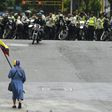 Venezuelan security forces are accused of running over, attacking and robbing protesters and journalists