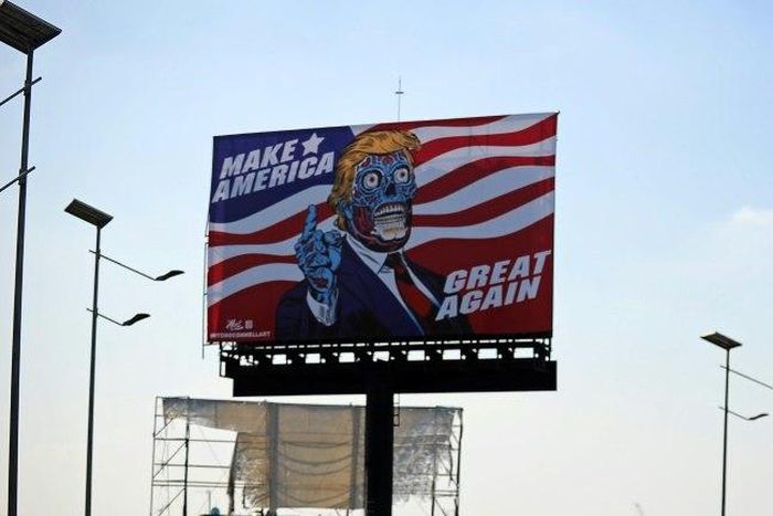 A billboard by US artist Mitch O'Connell depicting President Donald Trump displayed in Mexico City is in allusion and tribute to John Carpenter's 1988 cult movie "They Live"