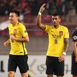 Guangzhou Evergrande's Paulinho (C) celebrates scoring a goal during an AFC Champions League match in Kashima, Japan, in May 2017