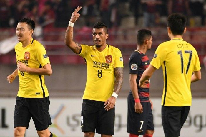 Guangzhou Evergrande's Paulinho (C) celebrates scoring a goal during an AFC Champions League match in Kashima, Japan, in May 2017