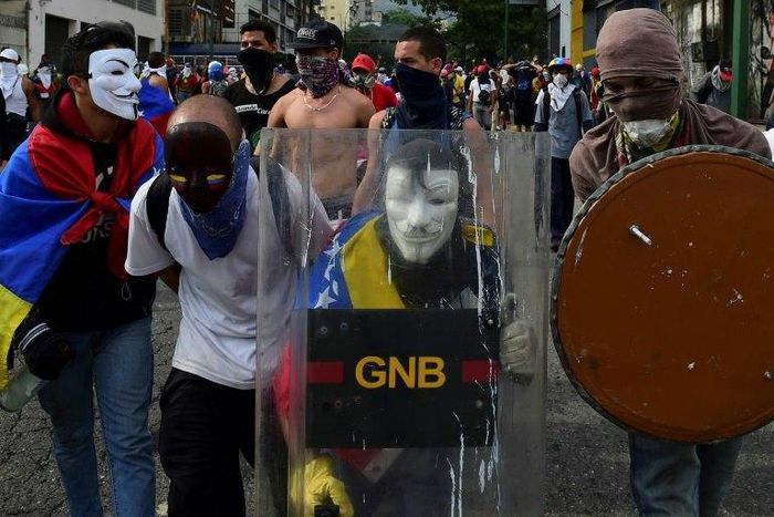 Anti-government protesters in Caracas on April 19, 2017, calling for President Maduro to go