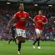Manchester United's striker Marcus Rashford (2nd R) celebrates with teammates after scoring the opening goal of the English Premier League football match against Leicester City August 26, 2017