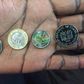 A set of the new look Kenyan coin currencies unveiled by President Uhuru Kenyatta