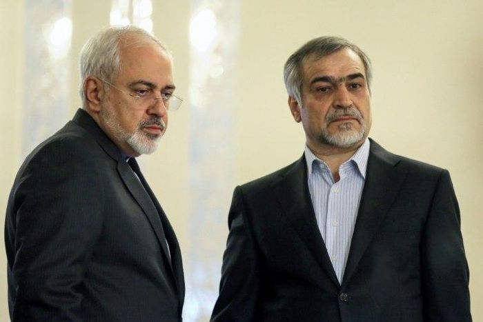 This file photo taken on April 3, 2015 shows Hossein Fereydoun (R) alongside Iranian Foreign Minister Javad Zarif at a news conference in Tehran