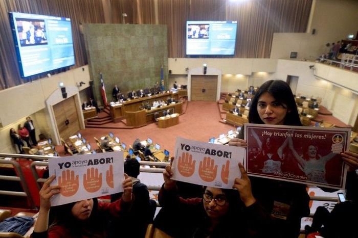 Activists participate in a pro-abortion demonstration inside Chile's National Congress on July 20, 2017