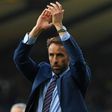 England's manager Gareth Southgate applauds supporters on the pitch after the group F World Cup qualifying football match against Scotland June 10, 2017