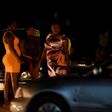 Prostitutes stand on the street in Benin City, Nigeria's capital for illegal migration. International Organization for Migration has recorded an explosion in the number of Nigerian women trafficked into Europe