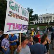 Protesters gather in front of the White House in Washington, DC in July against President Donald Trump's plan to ban transgender people from serving in the military