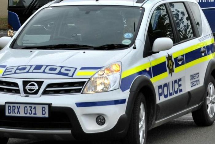 One of the suspects turned himself in at a South African police station, saying he was "tired of eating human flesh"