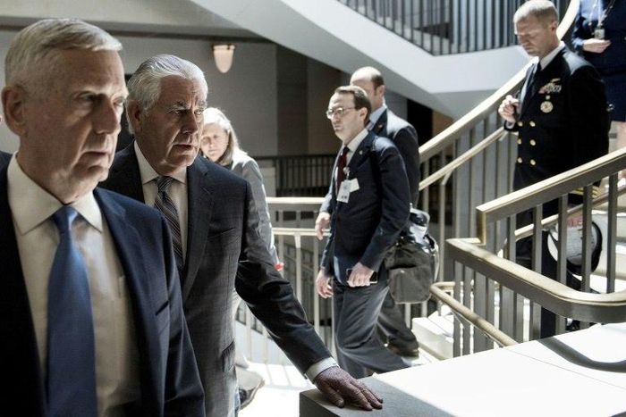 US Defense Secretary James Mattis, left, and Secretary of State Rex Tillerson, second left, are weighing whether to have Congress replace existing authorization for the use of military force against extremists