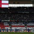 England and French players stand during a minute's silence ahead of the international friendly football match at the Stade de France stadium near Paris on June 13, 2017